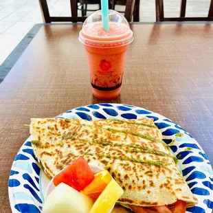 a plate of food and a drink