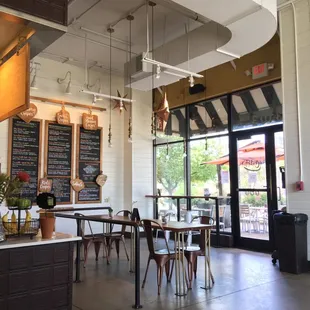 Interior view of entrance, menu, front counter