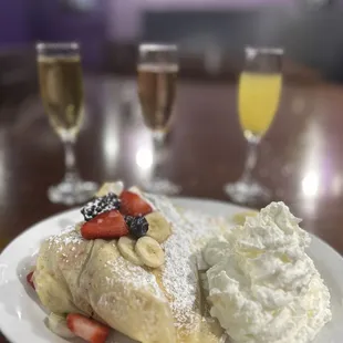 Berry Delight crepe with a mimosa flight.