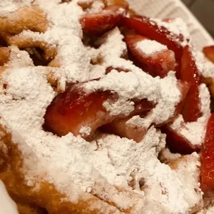 strawberries and powdered sugar on top