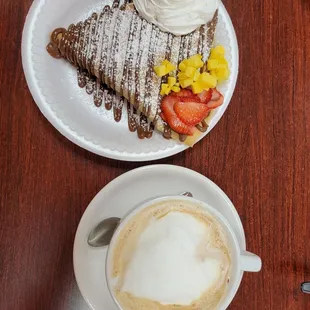  a crepe and a cup of coffee