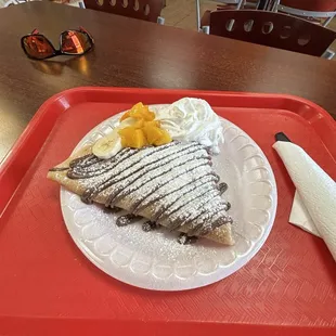 Bananas and peaches Nutella crepe