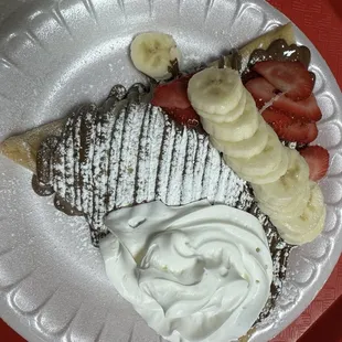 Nutella crepe with banana and strawberries