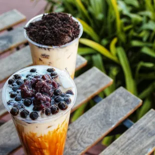 two drinks on a wooden table