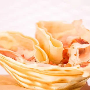 a person holding a pastry