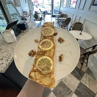 a person holding a plate of food