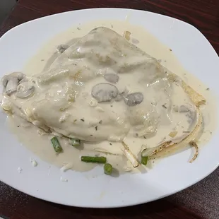 Grilled chicken and asparagus crepe with Chardonnay sauce