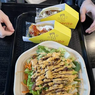 Two crepe-tacos and a rice bowl