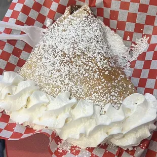 a pastry on a red table