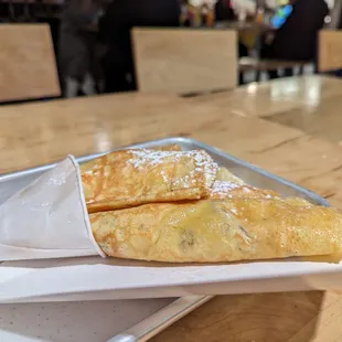 a plate of crepes