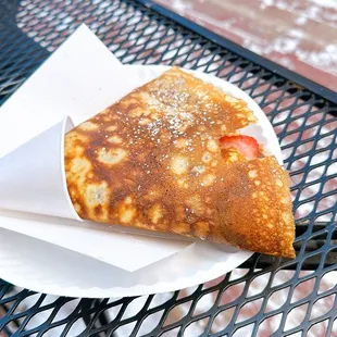 a piece of pizza on a table