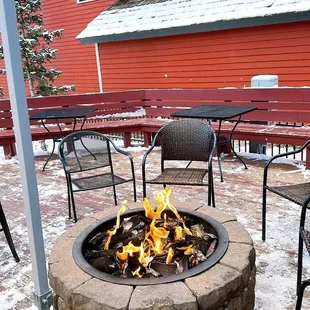 a fire pit in the snow