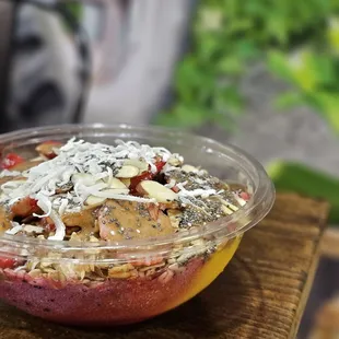a bowl of fruit and nuts