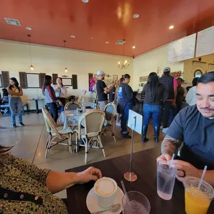 a group of people in a restaurant