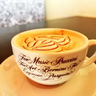 a cup of coffee on a saucer