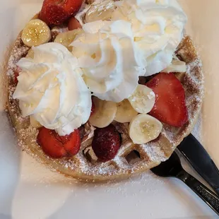 Belgium waffle with strawberries and Bananas and amazing whipped cream