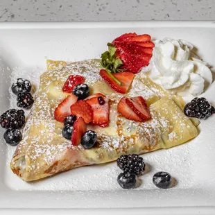 trawberries, blueberries, and whipped cream