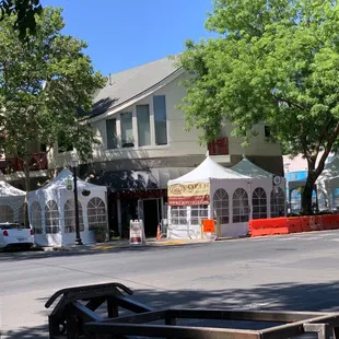 Outdoor seating as of 5/7/2021. These tents make no sense for current weather and COVID regulations.