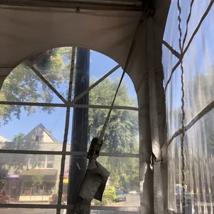 Sitting in a outdoor dining tent