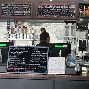 menus on the wall of a restaurant