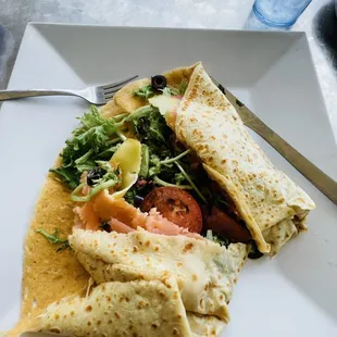 Crepe de Salmon cut into... it's always packed &amp; I'm more than stuffed if I eat the whole thing!