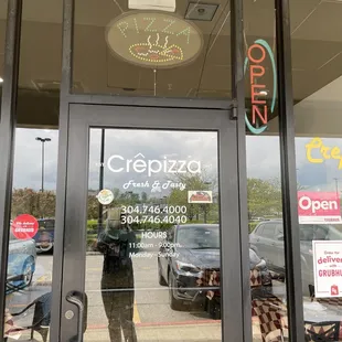 a reflection of a person in the window