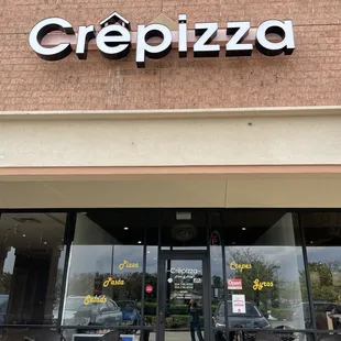 the front entrance of a restaurant