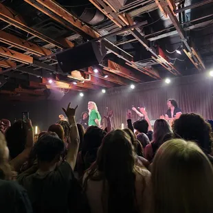 a group of people on stage