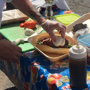 The Italian vegetable sandwich in production; the fresh mozzarella looks divine