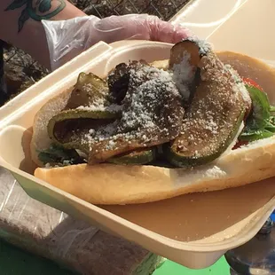 The grilled eggplant was the almost last layer of the Italian vegetable sandwich in production