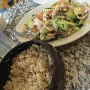 Chicken with mixed vegetables in white sauce with fried rice