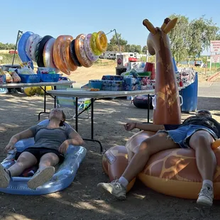 What the what? Shawnee and Selah are testing out our floaties we sell. I think they&apos;re taking it a bit too far