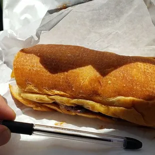 a sandwich in a wrapper