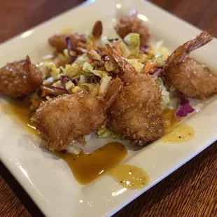 Coconut Shrimp - 6 pieces of shrimp attractively presented