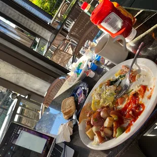Quiet and relaxing breakfast. Greek omelette, coffee, and toast.