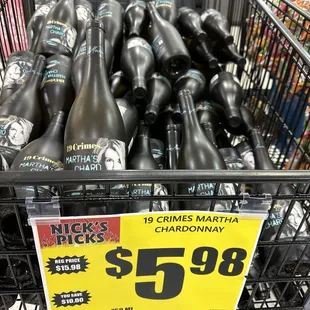 a basket full of bottles of wine