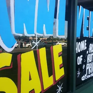 a sign in the window of a store