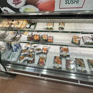 a display of sushi in a store