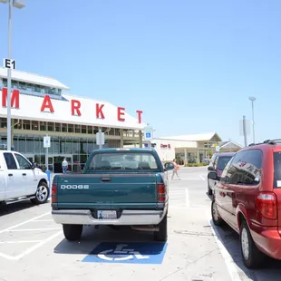two trucks parked in a parking lot