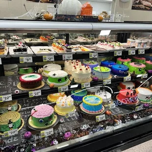 a variety of cakes on display
