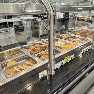 a variety of food items in a display case