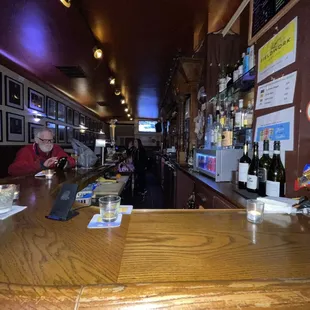 a man sitting at the bar