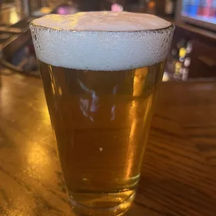 expertly poured beer