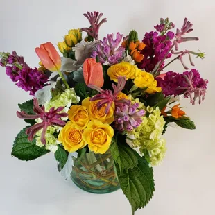 A bright mix of colors using some tulips and kangaroo paw.