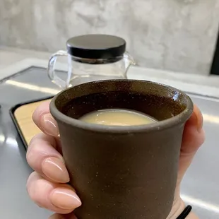 Pot of Freshly Steeped Masala Chai, Condensed Milk on the side