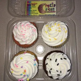 Strawberry, lemon, chocolate, and confetti cupcake.