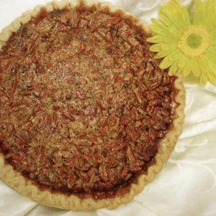 Southern custard pie topped with pecans.