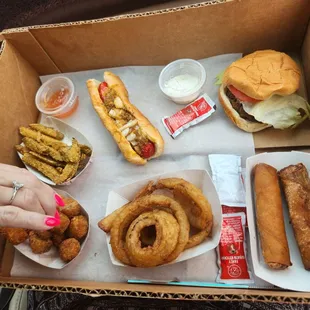 Pickle fries, hot dog, onion rings, hamburger, egg rolls, tater tots everything was delicious! Egg rolls are the best hands down