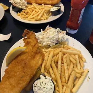 Fish (Haddock) &amp; Chips (fries) with cole slaw and tarter.