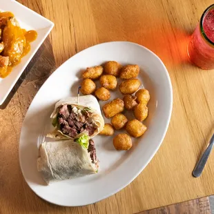 Thinly sliced 6 oz sirloin topped with lettuce* tomato* crumbled blue cheese * caramelized onions and balsamic vinaigrette